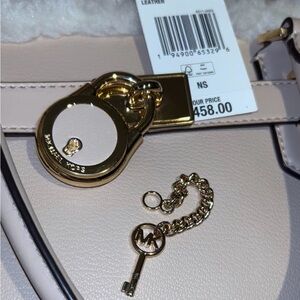Michael Kors Leather Hamilton purse with lock and Key Gold Hardware design